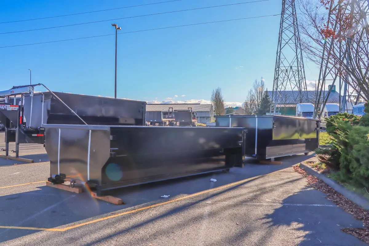 Roll-off dumpster ready for waste disposal at job site for Estate Cleanout Dumpster Rental in Starkville